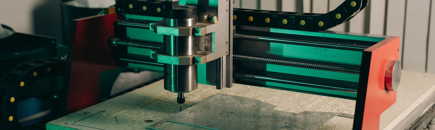 Close-up of precision industrial machine components being inspected for quality control